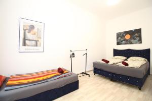 Cozy Rooms in Pragerstrasse客房内的一张或多张床位