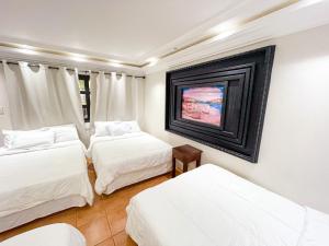 Hotel Villa Antigua客房内的一张或多张床位