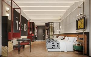 北京唐府酒店（北京三里屯工体店）的卧室配有白色的床、桌子和椅子