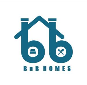KazhakuttamBnB Homes, Technopark, Trivandrum的带有bb家字的房子的标志