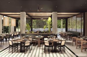 热那亚Capitolo Riviera的餐厅设有木桌、椅子和窗户。