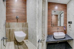 纳威孟买FabHotel Grand Inn I的一间带卫生间和水槽的浴室