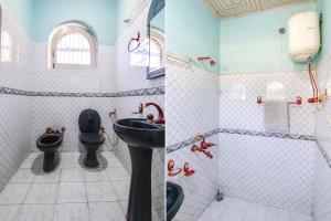 库尔卢FabExpress Malti Guest House的浴室设有2个卫生间和水槽