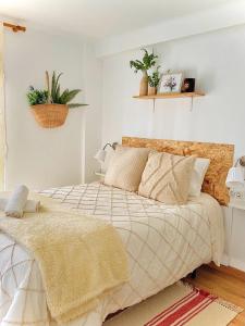 Alojamiento Calma客房内的一张或多张床位
