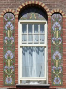 阿姆斯特丹冯德尔公园阿特拉斯酒店的砖楼一侧的窗户