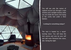 VuontisjärviArctic Nature Experience Glamping的一张房间里带火的帐篷的照片