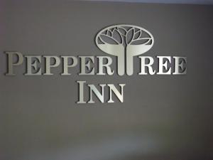 比弗顿胡椒树酒店的辣椒公司标志
