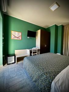 阿尔博尔格意大利酒店客房内的一张或多张床位
