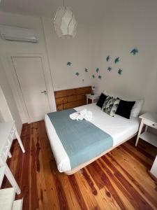 262 Baixa Guesthouse客房内的一张或多张床位