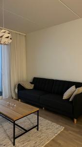 Casa Emerald, laadukas kaksio saunalla, wifi, matkakeskus 280 m, juna ja bussiasema的休息区