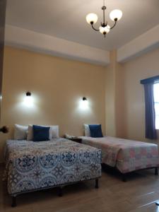 塞维利亚酒店客房内的一张或多张床位