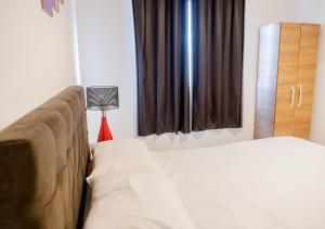 Rental Palhoça- Acomodações Residenciais客房内的一张或多张床位