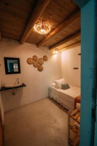 Casinha do Rio客房内的一张或多张床位