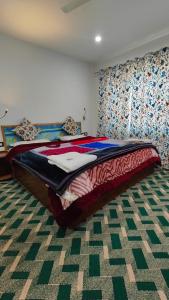 Tip Top Pahalgam客房内的一张或多张床位