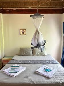 柬埔寨海滨之家旅馆客房内的一张或多张床位