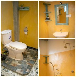 高尔Oynise Beach Cabin的浴室的两张照片,配有卫生间和水槽