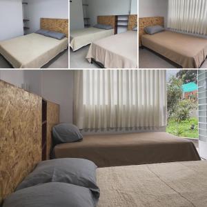 圣埃乌拉利亚Hospedaje Villa Justina的卧室享有四种不同的景色,配有两张床