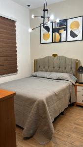 Lujoso apartamento Guatemala zona 10客房内的一张或多张床位