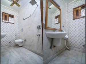 王舍城Hotel moon light的一间带水槽和卫生间的浴室