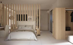 沃尔沃罗Haus Platanos Apartments & Bungalows by the Sea的卧室配有白色的床和木制床头板