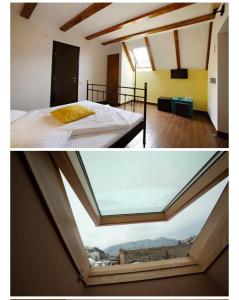 布拉索夫SIAN Sanctuary Villa的一间设有床铺和窗户的房间