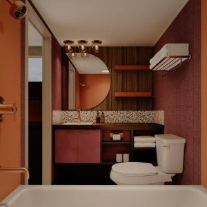 维多利亚Hotel Zed Victoria的一间带卫生间、水槽和镜子的浴室