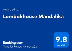 龙目岛库塔Lombokhouse Mandalika的洛姆博克斯威克马尼拉的蓝色标志