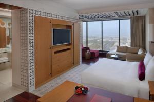 迪拜H酒店客房内的一张或多张床位