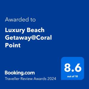 SibayaLuxury Beach Getaway@Coral Point的手机的屏幕,短信被授予豪华海滩度假珊瑚