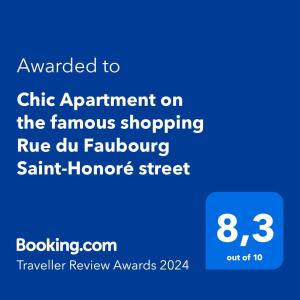 巴黎Chic Apartment on the famous shopping Rue du Faubourg Saint-Honoré street的手机的屏幕,手机的文本升级到芯片预约,在著名的