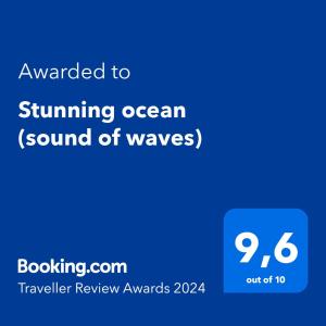 温哥华Stunning ocean (sound of waves)的一部电话的屏幕,上面有温暖海洋的词和波浪的声音