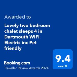 达特茅斯Caldon Holiday Chalet sleeps 4 in Dartmouth WIFI Electric inc Pet friendly的一部手机的屏幕,上面的文本被授予忠诚的两步棕色粉笔