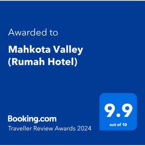 关丹Mahkota Valley (Rumah Hotel)的一部手机的屏幕,上面有要写到Malikota山谷的文字