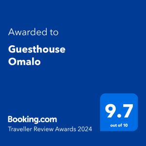 OmaloGuesthouse Omalo的蓝电话屏幕,文字被授予旅馆