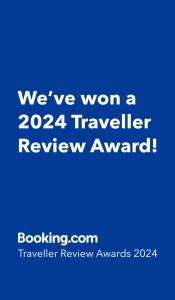 弗雷兴Hotel Haus Loewe的蓝标,我们赢得了旅行者评审奖