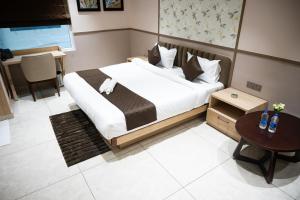 Hotel SUI客房内的一张或多张床位