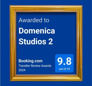 塞萨洛尼基Domenica Studios 2的金色画框,标有多米尼卡斯图迪奥斯的作品