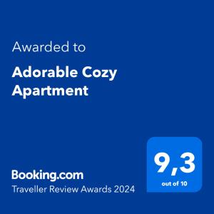 Adorable Cozy Apartment的证书、奖牌、标识或其他文件