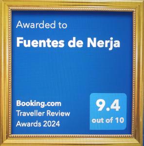 内尔哈Fuentes de Nerja的标牌在标牌上写给neeria特许权