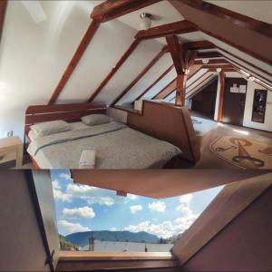 布拉索夫SIAN Sanctuary Villa的一张卧室的照片,卧室里设有一张床和一个窗户