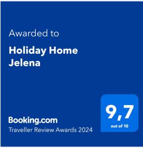 扎斯特拉齐塞Holiday Home Jelena的手机的屏幕,手机的短信是给Jezena度假屋的