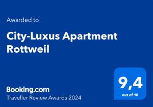 罗特威尔City-Luxus Apartment Rottweil的蓝色长方形与城市豪华公寓的字样