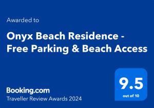 圣弗拉斯Onyx Beach Residence - Free Parking & Beach Access的外露海滩住宅的屏风免费停车场和海滩通道