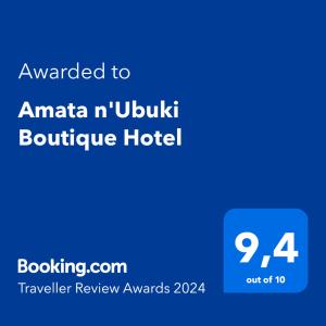 基加利Amata n'Ubuki Boutique Hotel的amanta n ubuntu精品酒店的蓝色标语