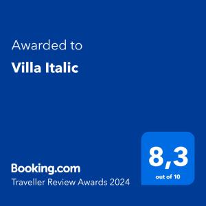 安塔利亚Villa Italic的手机的屏幕,手机的文本被授予别墅意大利语