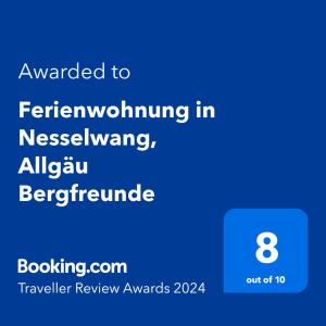 内森尔旺Ferienwohnung in Nesselwang, Allgäu Bergfreunde的手机的屏幕,手机上传的文本被重新调换