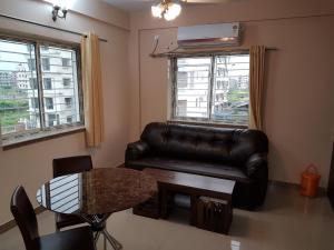 LOTUS APARTMENTS HOTEL的休息区