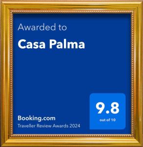 圣米格尔-杜戈斯托苏Casa Palma的一张照片框,上面有被授予casa palma的文字