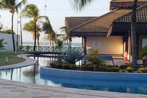 弗雷谢拉斯Flecheiras Eco Residence Un302的海滨度假胜地,设有游泳池