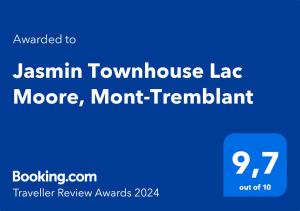 蒙特朗布朗Jasmin Townhouse Lac Moore, Mont-Tremblant的蓝色标志,加上 ⁇ 莉花的联排别墅,比更糟